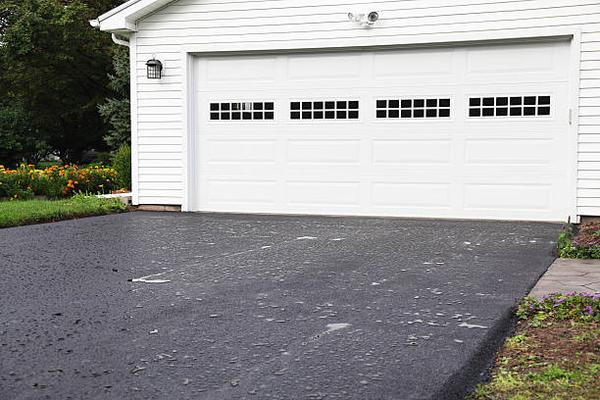 Seasonal Garage Door Maintenance Tips for Every Homeowner